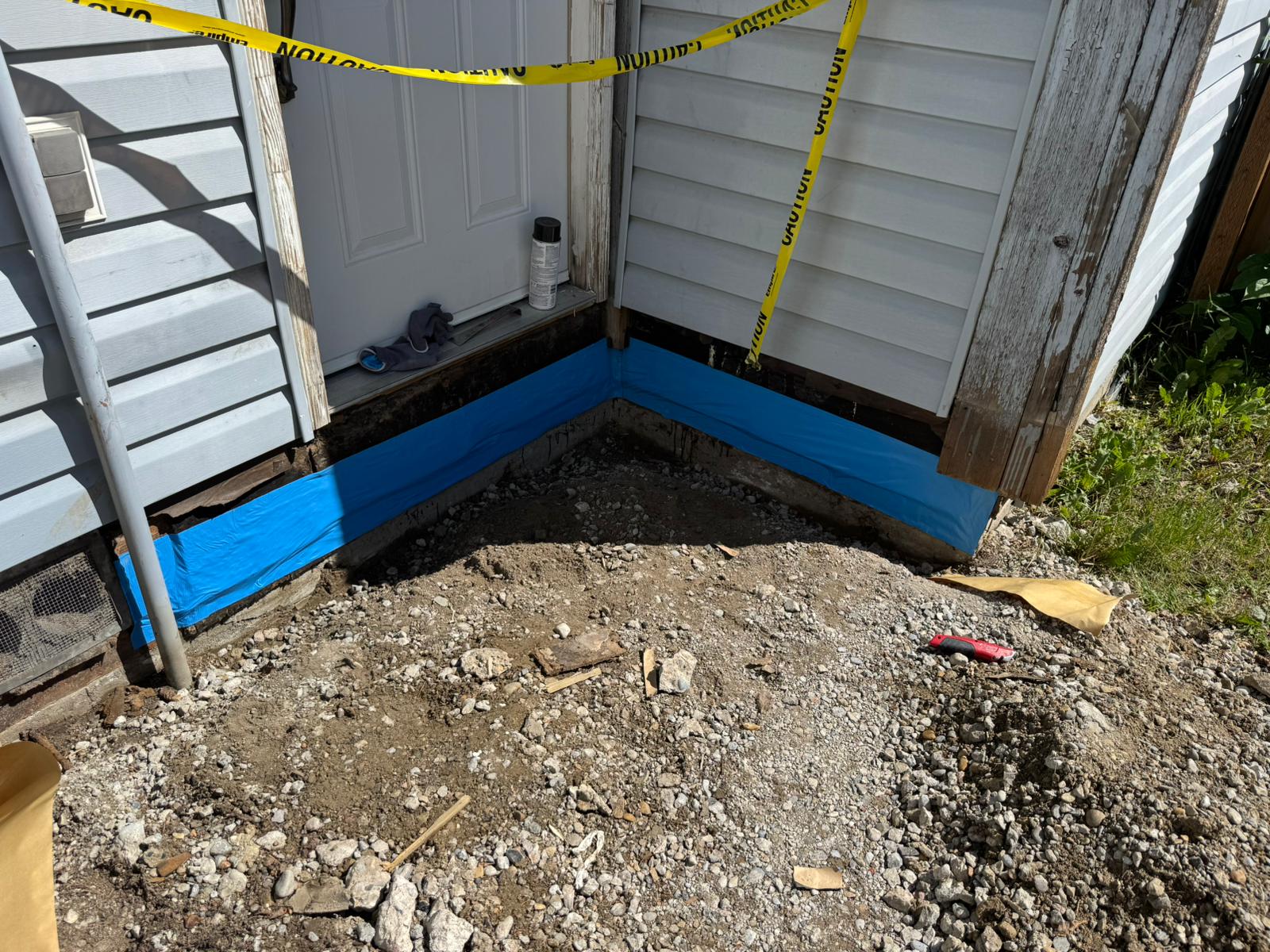 AWK Corporation blue-skin vapour barrier installation on condominium building envelope