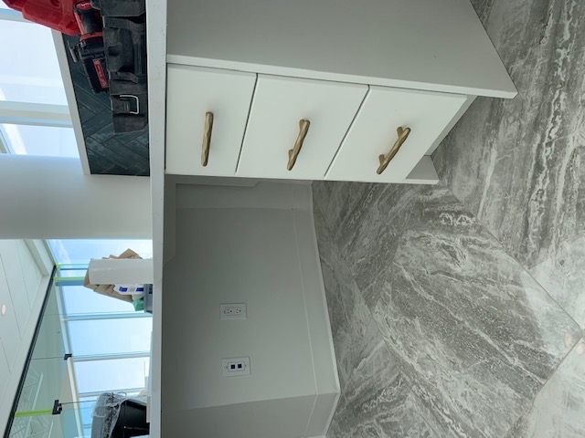 AWK Corporation commercial building exterior with new siding and doors